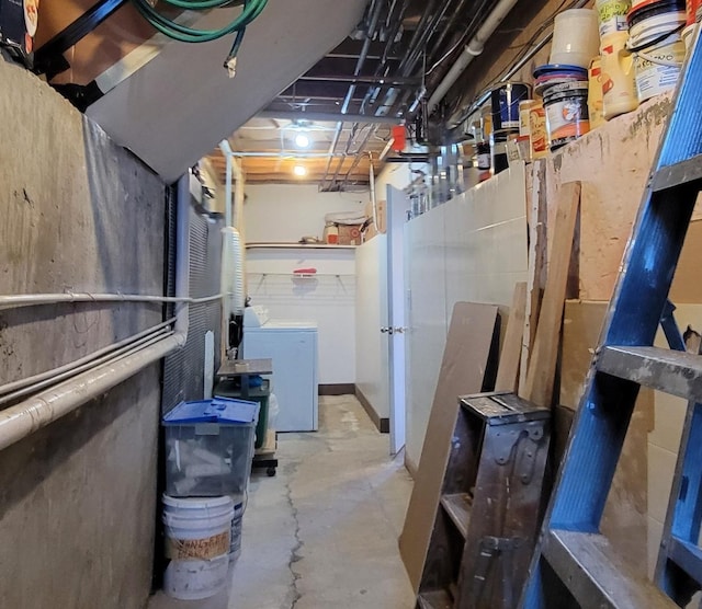 unfinished below grade area with washer / clothes dryer