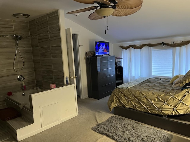 carpeted bedroom featuring vaulted ceiling and ceiling fan