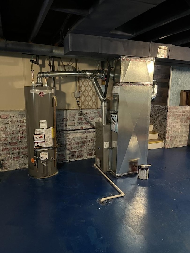 utility room with gas water heater and heating unit