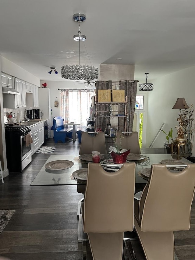 dining area with dark wood-type flooring