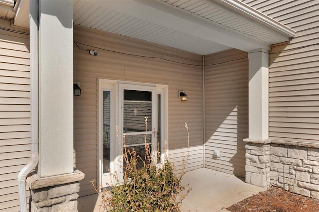 view of exterior entry with stone siding