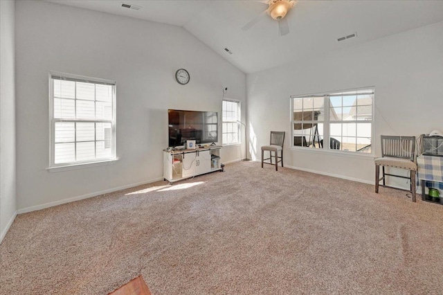 unfurnished room with visible vents, carpet flooring, baseboards, and ceiling fan