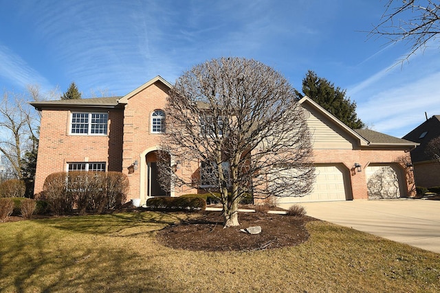 view of front of house featuring a garage, a front yard, brick siding, and driveway