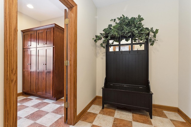 interior space featuring baseboards