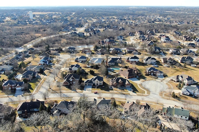 birds eye view of property with a residential view