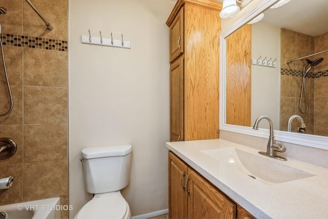 bathroom with vanity, toilet, and shower / bathtub combination