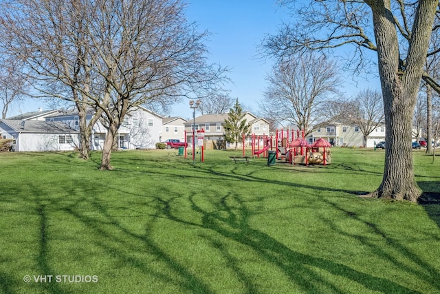 view of yard with playground community and a residential view