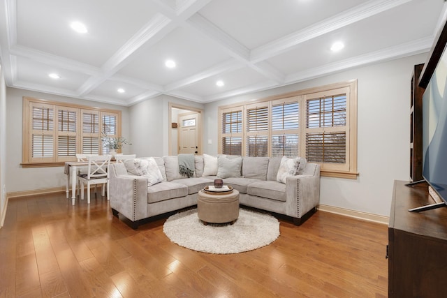 living area featuring beam ceiling, coffered ceiling, baseboards, and wood finished floors