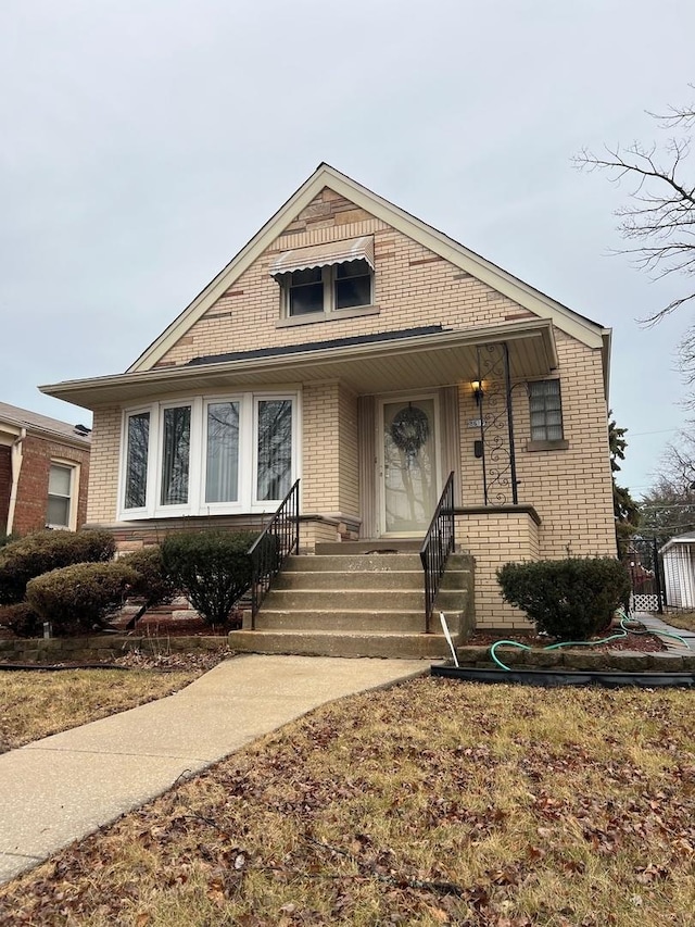 view of front of home with brick siding