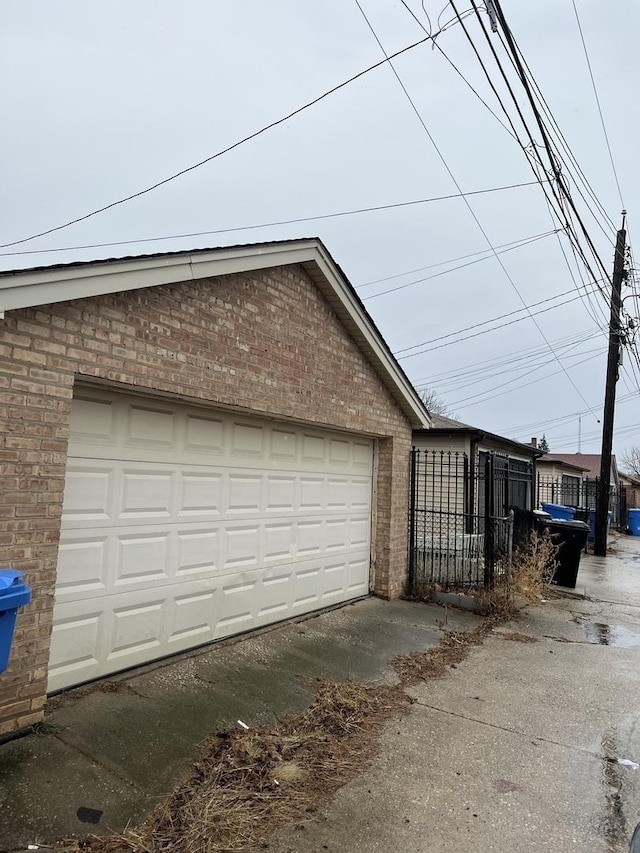 garage featuring fence