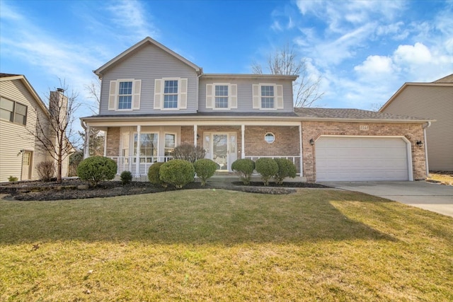 traditional home with a front lawn, driveway, a porch, an attached garage, and brick siding