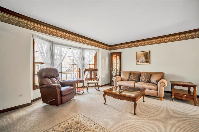 carpeted living area with crown molding and baseboards