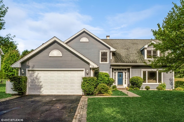 view of front of property featuring aphalt driveway, a front yard, roof with shingles, and an attached garage