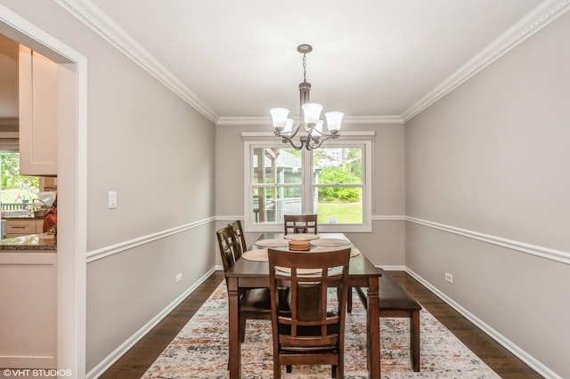 dining space with a chandelier, dark wood-type flooring, and a wealth of natural light