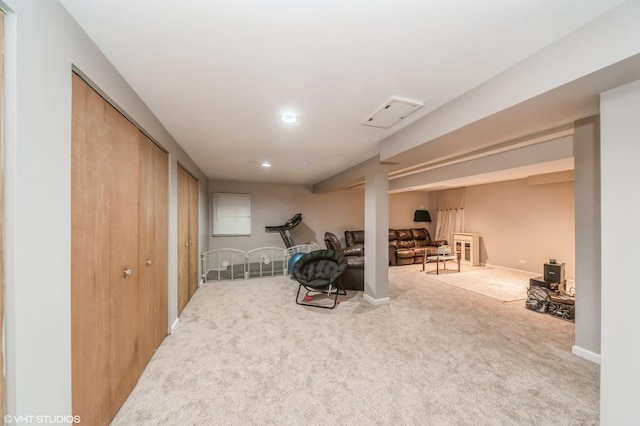 interior space featuring carpet, baseboards, and recessed lighting