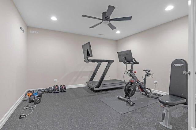 exercise area with recessed lighting and baseboards