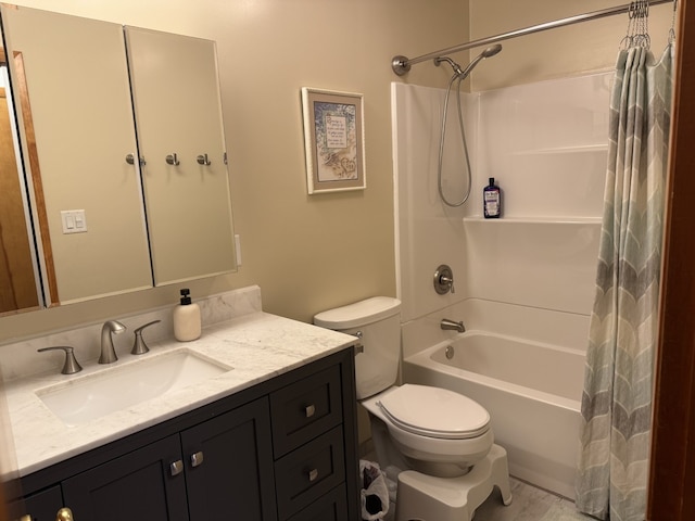 bathroom featuring shower / tub combo, vanity, and toilet