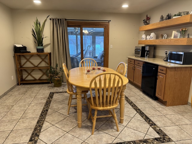 dining area featuring recessed lighting, baseboards, and light tile patterned floors