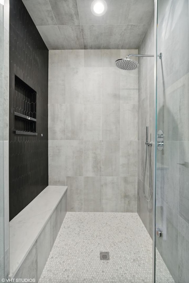 bathroom featuring a stall shower