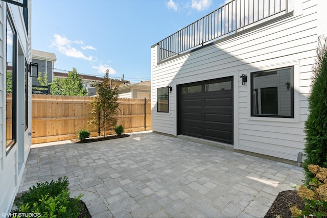 garage featuring fence