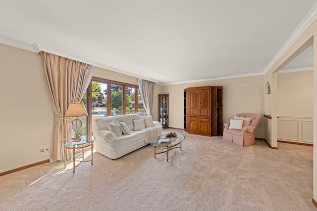 living area featuring carpet floors, crown molding, and baseboards