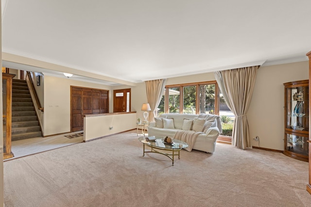 unfurnished living room featuring stairs, crown molding, baseboards, and light colored carpet