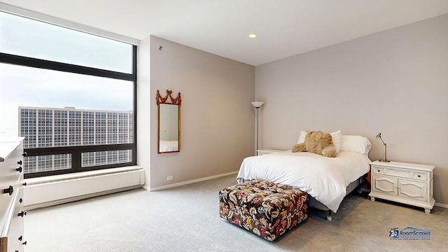 bedroom with baseboards and carpet flooring