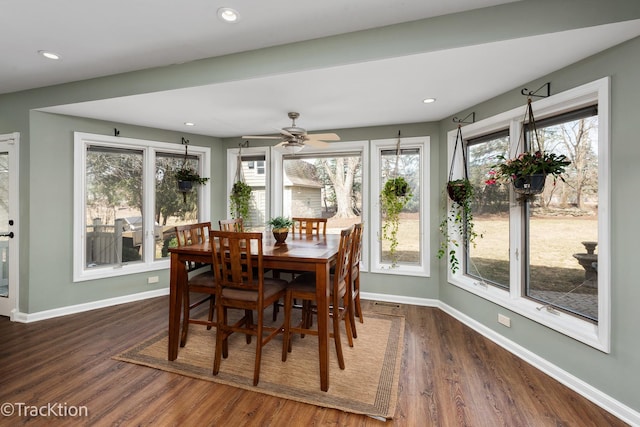 dining room with recessed lighting, baseboards, and wood finished floors