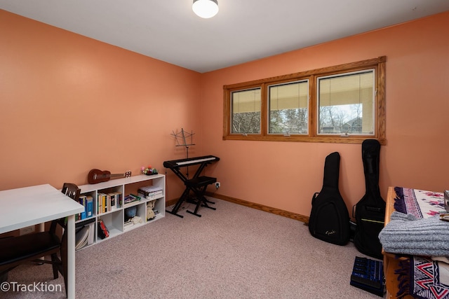 game room with baseboards and carpet