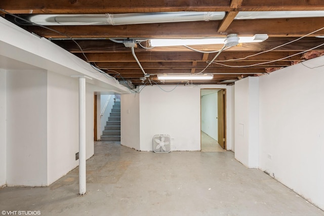 unfinished basement with stairs