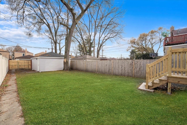 view of yard featuring an outbuilding and a fenced backyard