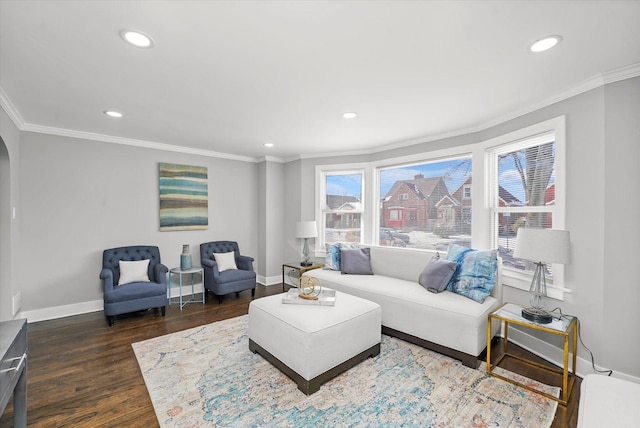 living room featuring crown molding, dark wood-style flooring, recessed lighting, and baseboards