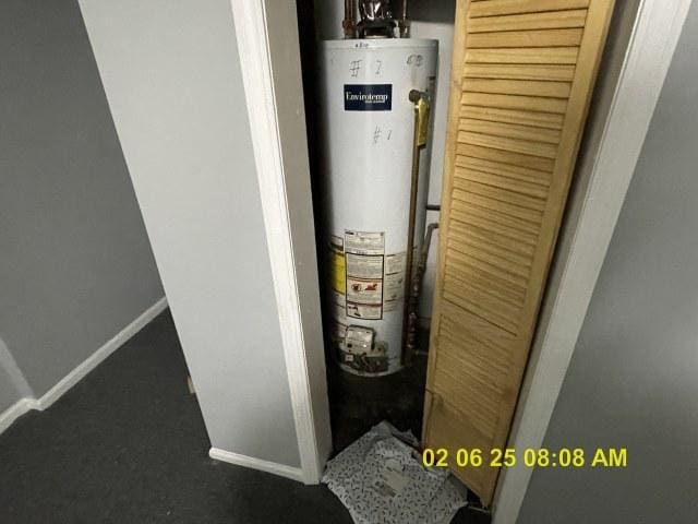 utility room with water heater