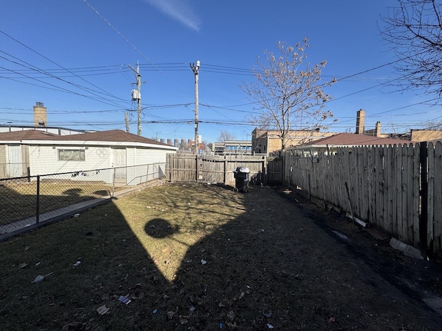 view of yard featuring a fenced backyard