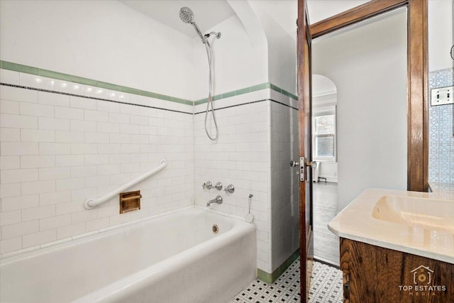 bathroom featuring vanity and shower / bathing tub combination
