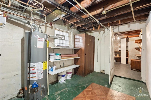 basement featuring gas water heater