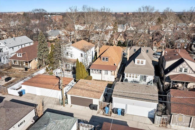 birds eye view of property with a residential view