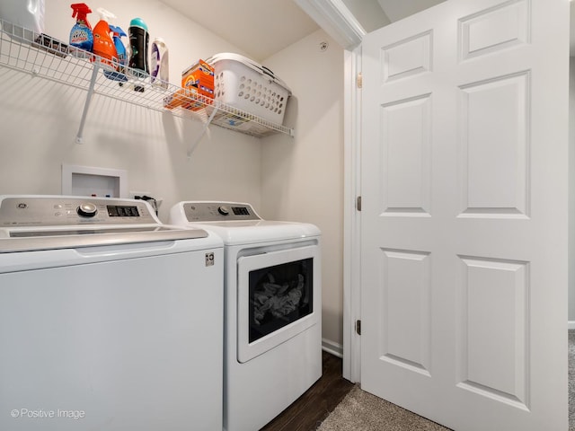 laundry area featuring washer and clothes dryer and laundry area