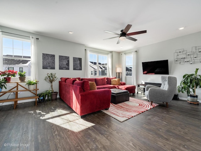 living area with recessed lighting, wood finished floors, and a ceiling fan