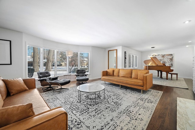 living room with dark wood-style floors, recessed lighting, and baseboards