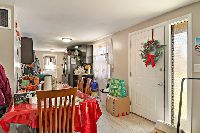 dining space featuring visible vents