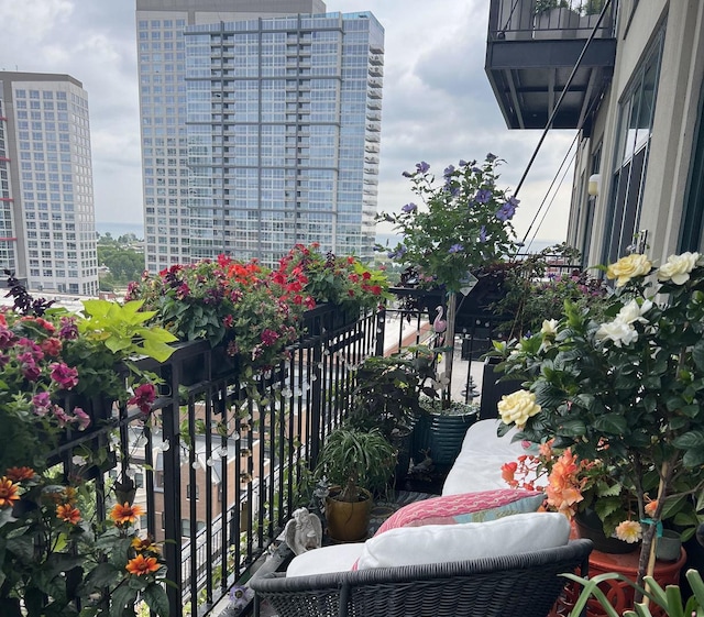 balcony featuring a city view