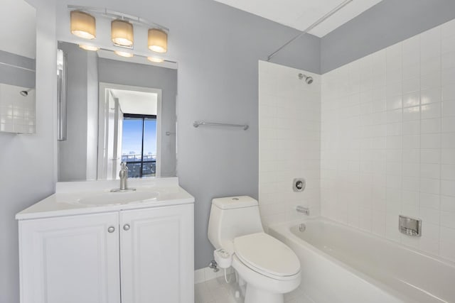 bathroom with tile patterned flooring, vanity, toilet, and bathing tub / shower combination