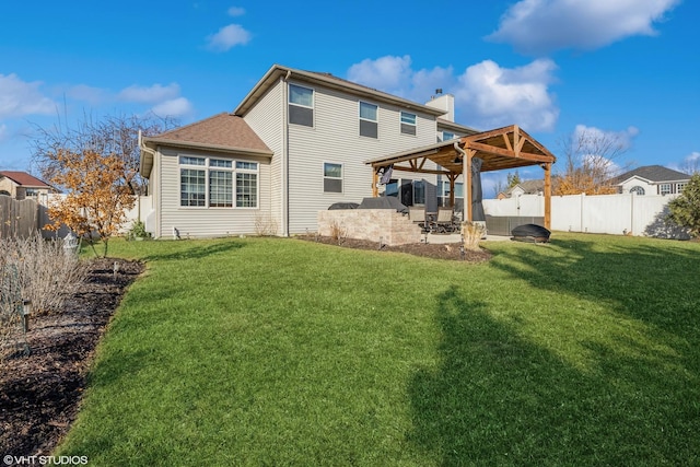 rear view of property with a patio, a fenced backyard, a lawn, and a chimney