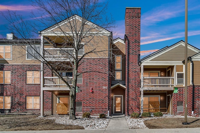 view of front of property featuring brick siding