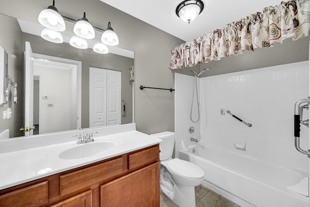 bathroom with shower / tub combination, toilet, and vanity