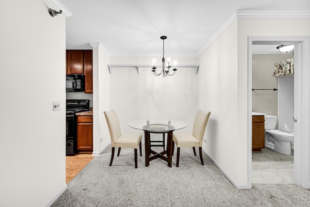 dining space featuring a notable chandelier, crown molding, and baseboards