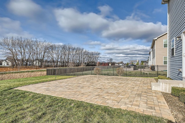 view of patio / terrace featuring fence