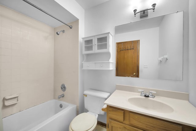 full bathroom featuring toilet, washtub / shower combination, and vanity