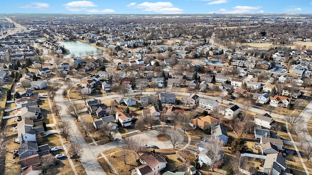 aerial view featuring a water view and a residential view